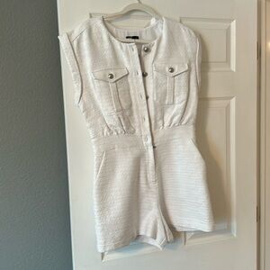 Super cute White Romper by Express Size 10 Never worn. Still have tags